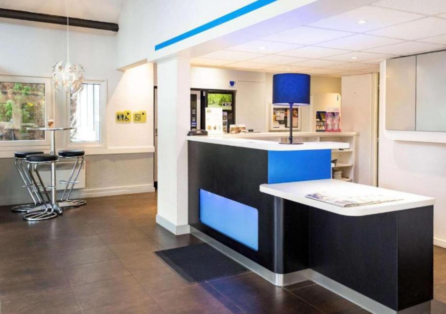 Hotel Ibis Budget Nantes Ouest Atlantis Coueron Экстерьер фото