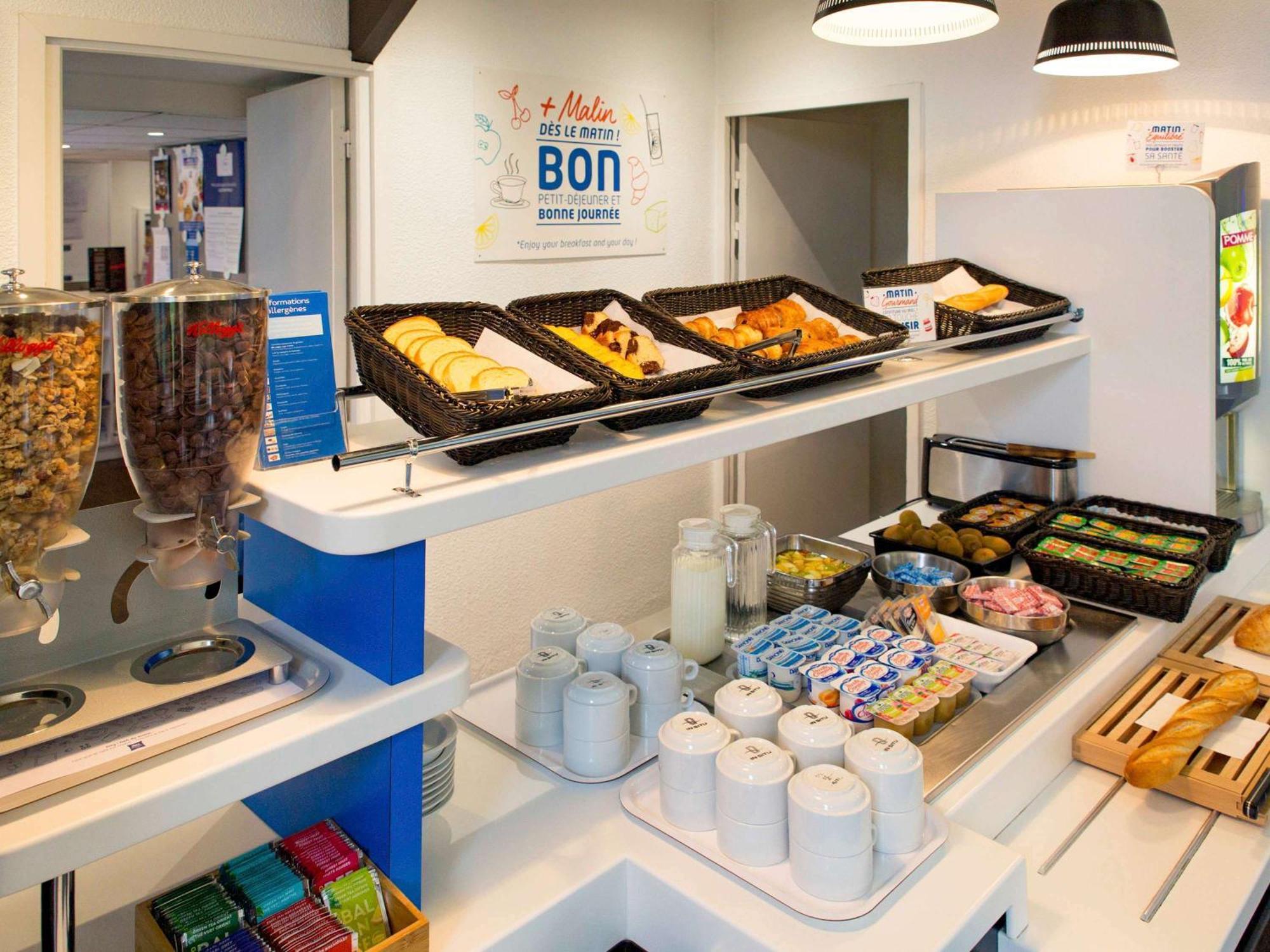 Hotel Ibis Budget Nantes Ouest Atlantis Coueron Экстерьер фото